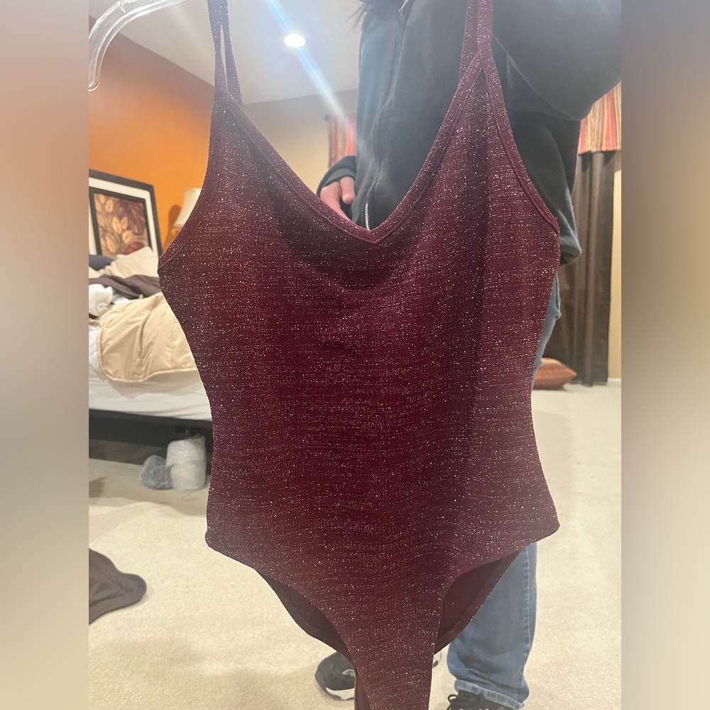 maroon sparkle body suit